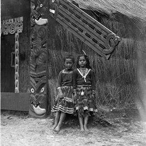 Two Maori girls and a Maori building Tearohanui in the ...