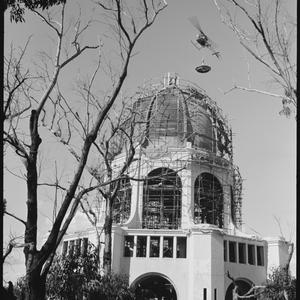 Helicopter lift during construction of Bahai temple. Fr...