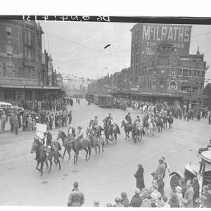 Procession of men and women pupils from the Walker Butl...