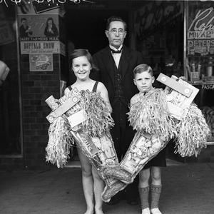 Doreen Beresford and Ronnie Collins with their first and second prize Christmas stockings, Paddington
