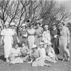 Group of thirteen young women on the lawn
