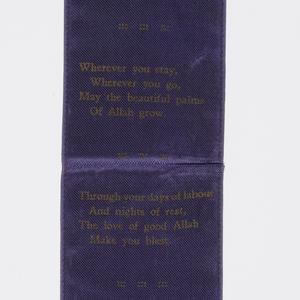 [Purple satin bookmark with gold braides inscribed with...