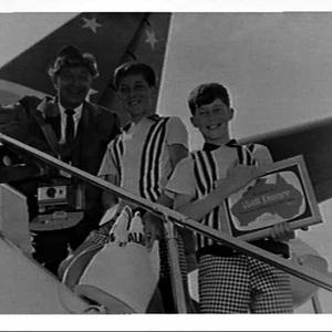 Television personality Reg Quartly and two boy winners ...