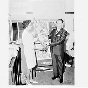 Lufthansa staff present flowers to Travel Manager, Bank...