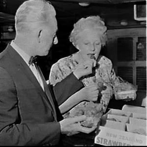 Ethel Brice samples food in the galley of the liner Ors...