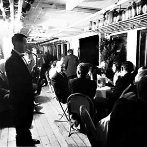 Party in evening dress on the Manly ferry South Steyne ...