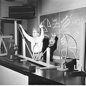 Professor Julius Sumner Miller photographed in his labo...