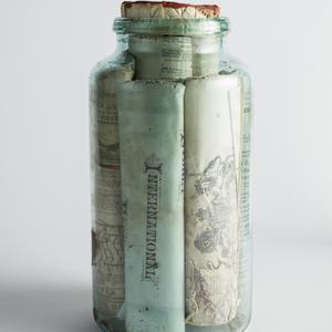 Jar containing parchment and newspapers buried during c...
