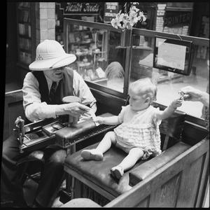 People being weighed - scales, 6 December 1937