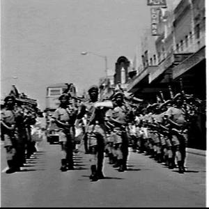 Papua New Guinea Army Pipe Band performs in the shoppin...