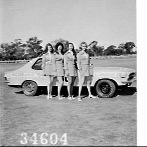Women Holden dealers team (motor sport) pose with Colin...