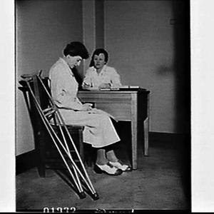 Marian Kite, handicapped by polio, working at Rachel Fo...